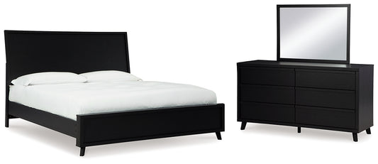 Danziar King Panel Bed with Mirrored Dresser