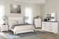 Gerridan Queen Panel Bed with Mirrored Dresser, Chest and Nightstand